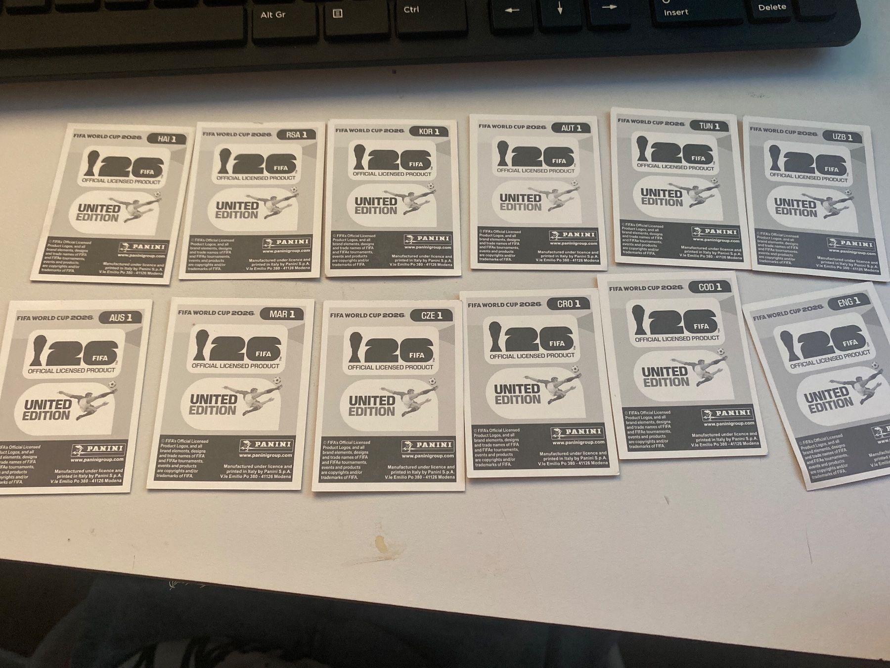 Panini Sammelbilder & Trading cards: WM PANINI STICKER 2026 WM LOGOS – Gebraucht aus Schwarzenbach SG von ise_6lgj 1