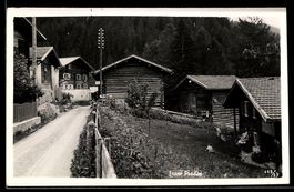 AK Praden, Inner Praden, Straße mit Holzhäusern