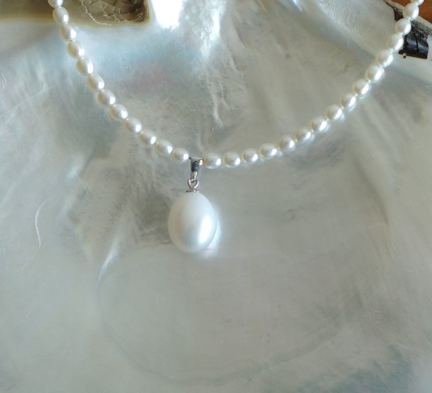 Catenine: Perlenkette mit Anhänger, weiss – Nuovo e nell'imballaggio originale da Rümlang venduto da 21f 1