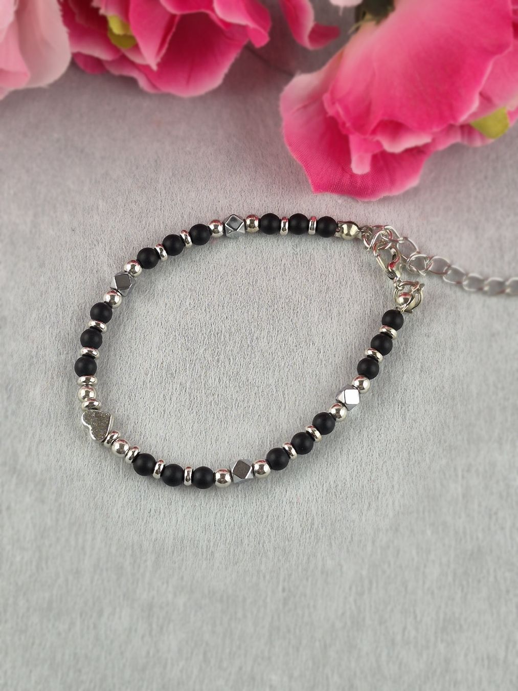 Bracciali & Braccialetti: Naturstein Perlenarmband Glücksbringer, schwarz – Nuovo e nell'imballaggio originale da Wädenswil venduto da Orso31