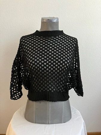 Pull résille noir, T 38