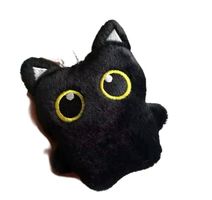 Katze Plüschtier schwarz grosse Augen