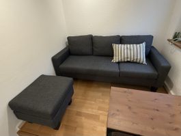 Sofa mit Hocker