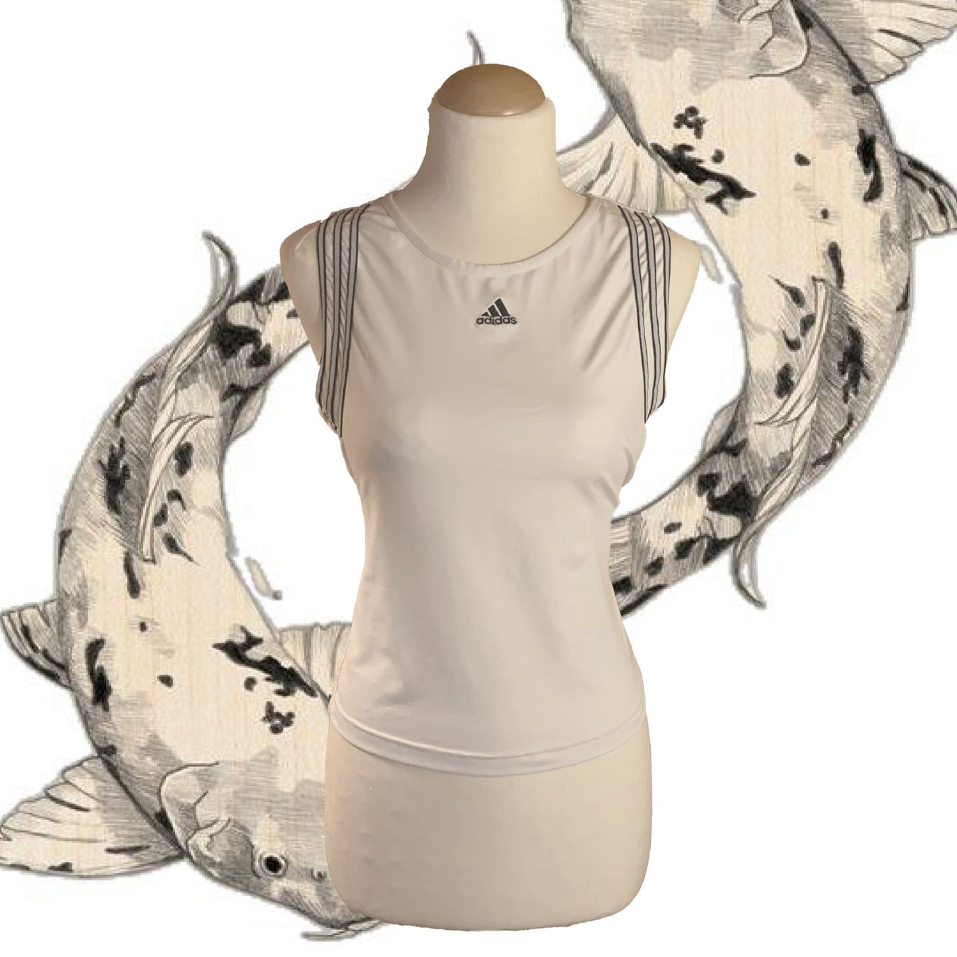 Adidas Top: Adidas ärmelloses weißes Oberteil – Usato da Chalais venduto da Decoarts.art