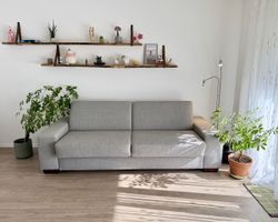 Canapé-lit gris avec vrais matelas inclus