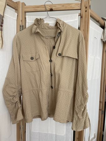 Blouse with a lot of details