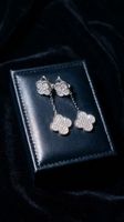 Boucles d'oreilles trèfle argenté zirconium