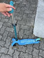 Micro Scooter mit mit leuchtenden Rädern