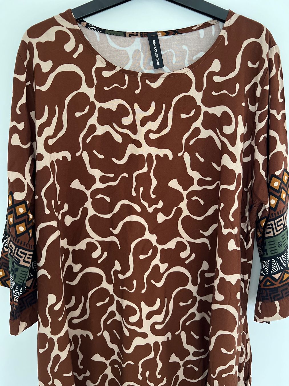 Kleider: Damenkleid braun gemustert Gr. 42 – Gebraucht aus Ebmatingen von Mistelu 1