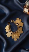 Agatha Paris grand bracelet à breloques fantaisie en or 1980