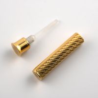Nachfüllbare Parfümflasche aus 18k Gold