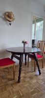 Belle table ronde traditionnelle en bois massif