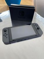Console Nintendo Switch avec station grise occasion + 4 jeux