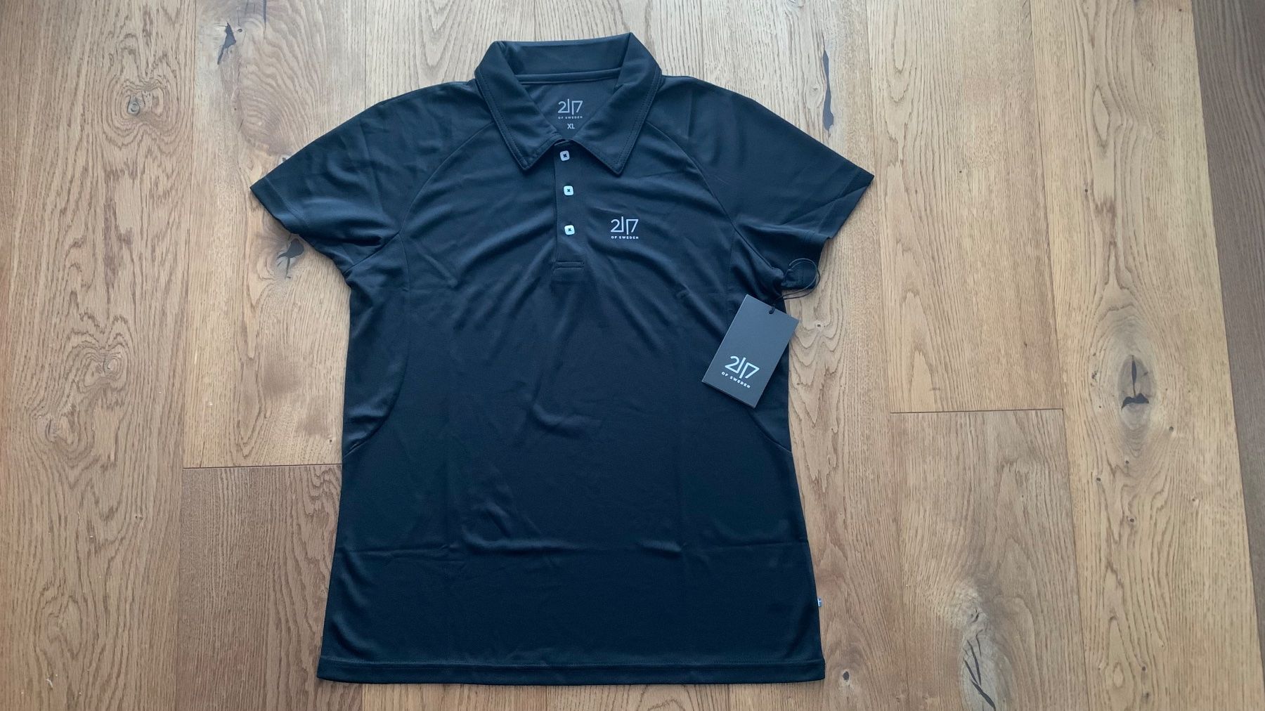 Polo-Shirts: Poloshirt 2117 twentyone seventeen – Neu und originalverpackt aus Ried-Brig von Feuerhut