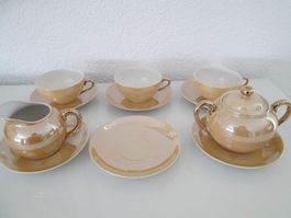 3 Teetassen, 6 Untertassen,1Milchkrug,1 Zuckerdose