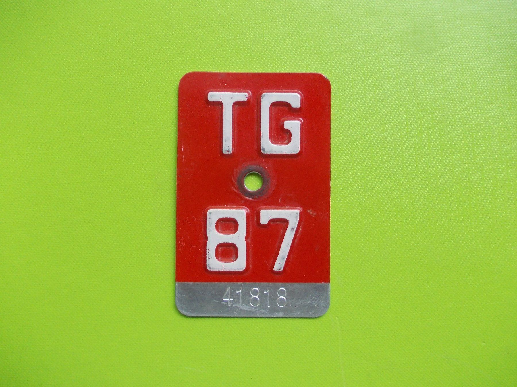 Insegne: Velonummer / Fahrradnummer TG 87 – Usato da Gsteigwiler venduto da HORMIGA21