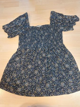 Umstands Oberteil Grösse L schwaz mit Blumen