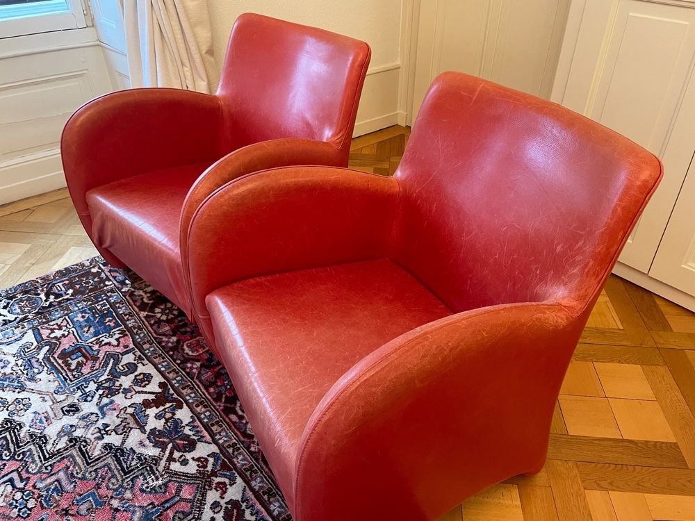 Fauteuils rouges des années 70