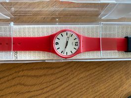 Montre Swatch bracelet rouge cadran blanc état neuf