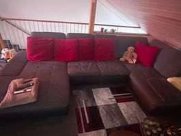 Ecksofa braun,Stoff mit roten Kissen guter Zustand