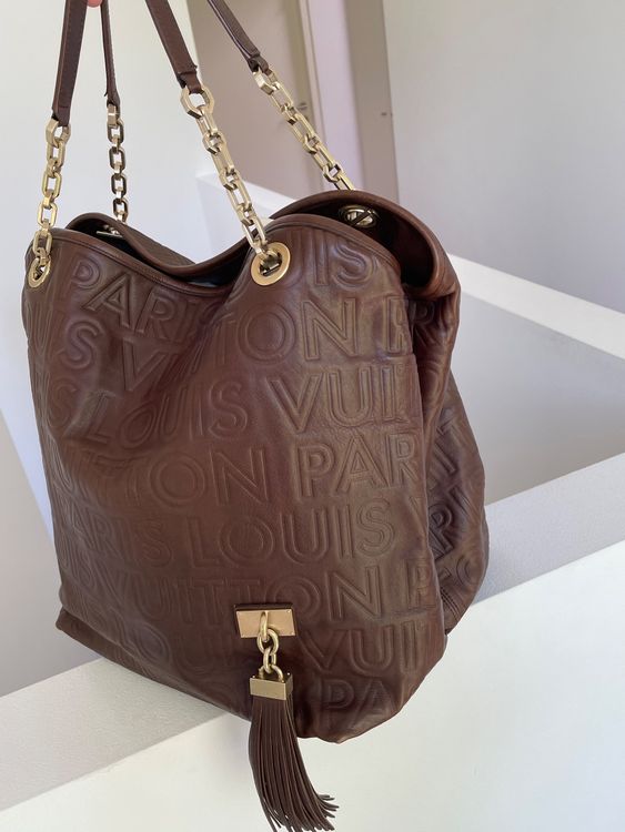 sac a main louis vuitton paris souple whispers pm cuir