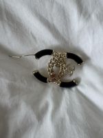 Broche noir et or bijou femme occasion - DÉFECTUEUX 