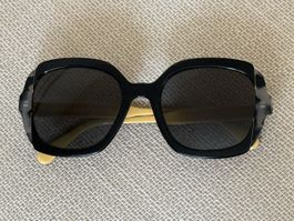 Lunettes de soleil noir/jaune/marron Prada
