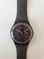 Montre Swatch noire et rose