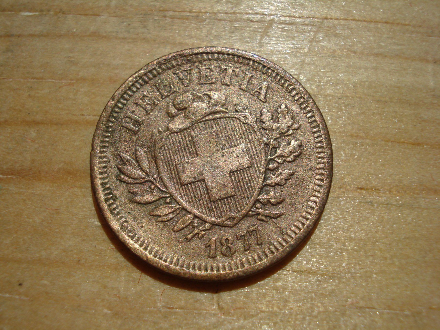 Tutti le monete: (N2) 1 Rappen 1877 – Usato da Erlach venduto da Net-Coins