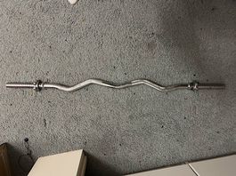 Curlstange mit verschiedenen Gewichten
