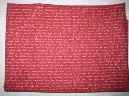 Baumwollstoff dunkelrot mit weisser Schrift