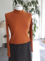 Damen-Shirt mit speziellen Armausschnitt