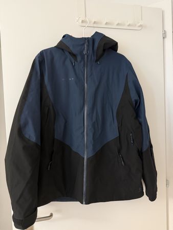 Veste Mammut bleue et noire taille XL bon état
