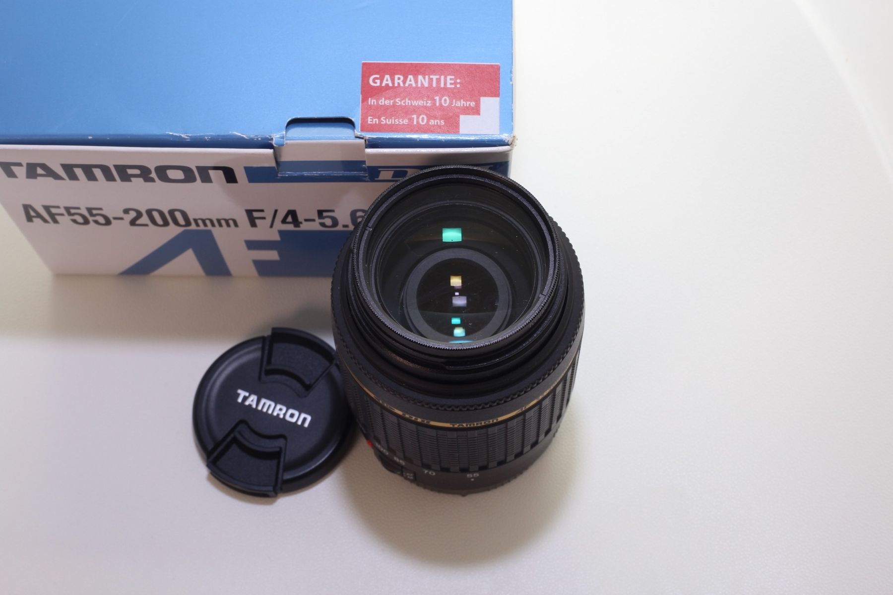 Tamron Obiettivi: Tamron AF 55-200 1:4-5,6 MACRO – Nuovo e nell'imballaggio originale da Luzern venduto da SIR_d8b8 2