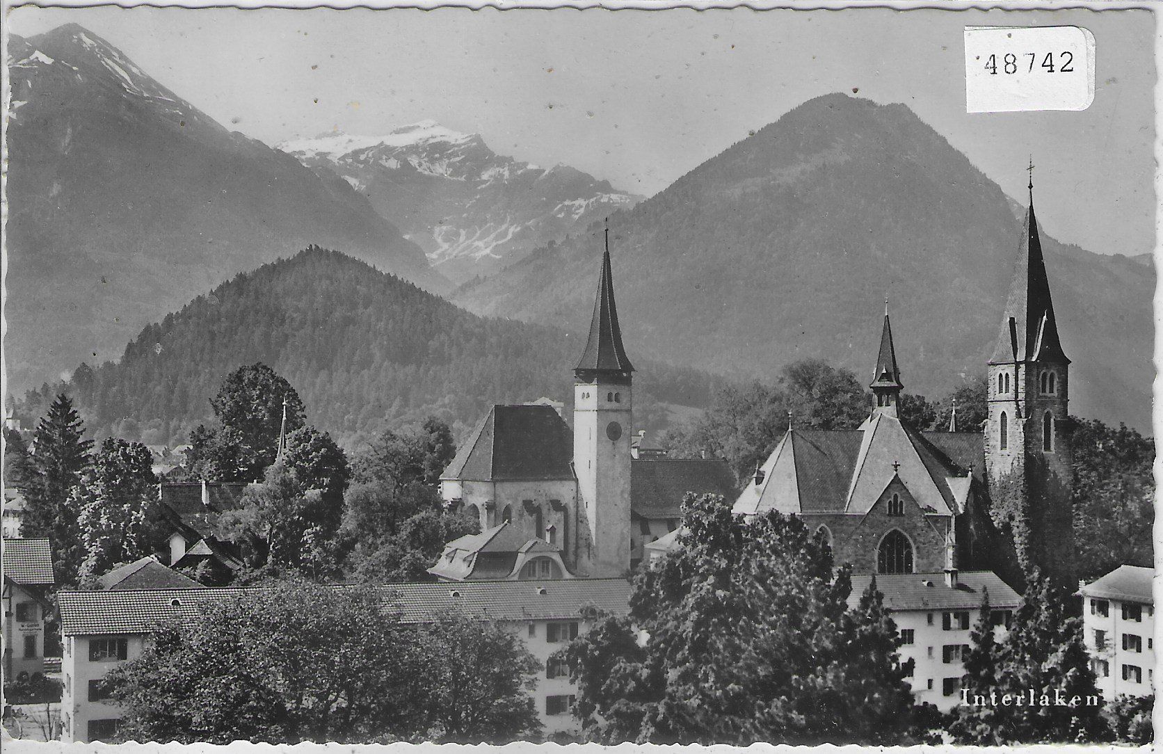 Cartoline postali: Interlaken - Prot. u. Kath. Kirche – Usato da Ettingen venduto da Kartenplanet