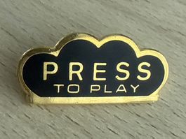 Pin PRESS TO PLAY