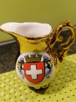 Schöner Porzellan Krug. Mit Schweizer Wappen.