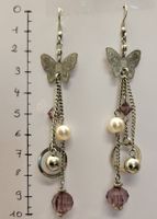 Boucles d'oreilles papillon argentées pendantes chic 🦋💜.
