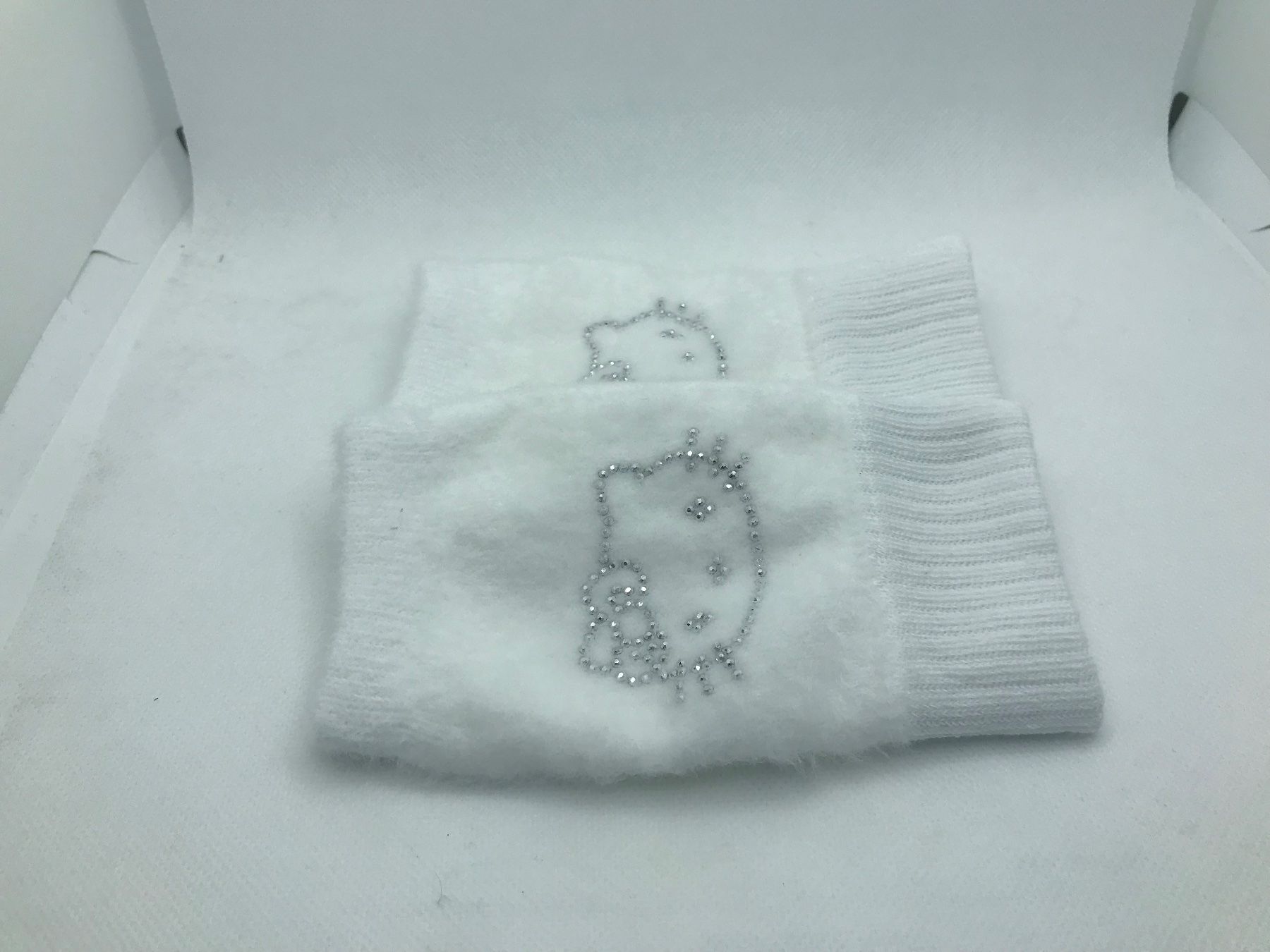 Guanti: Hello Kitty Handstulpen, Neu, klein – Nuovo e nell'imballaggio originale da Niederteufen venduto da mix18 3