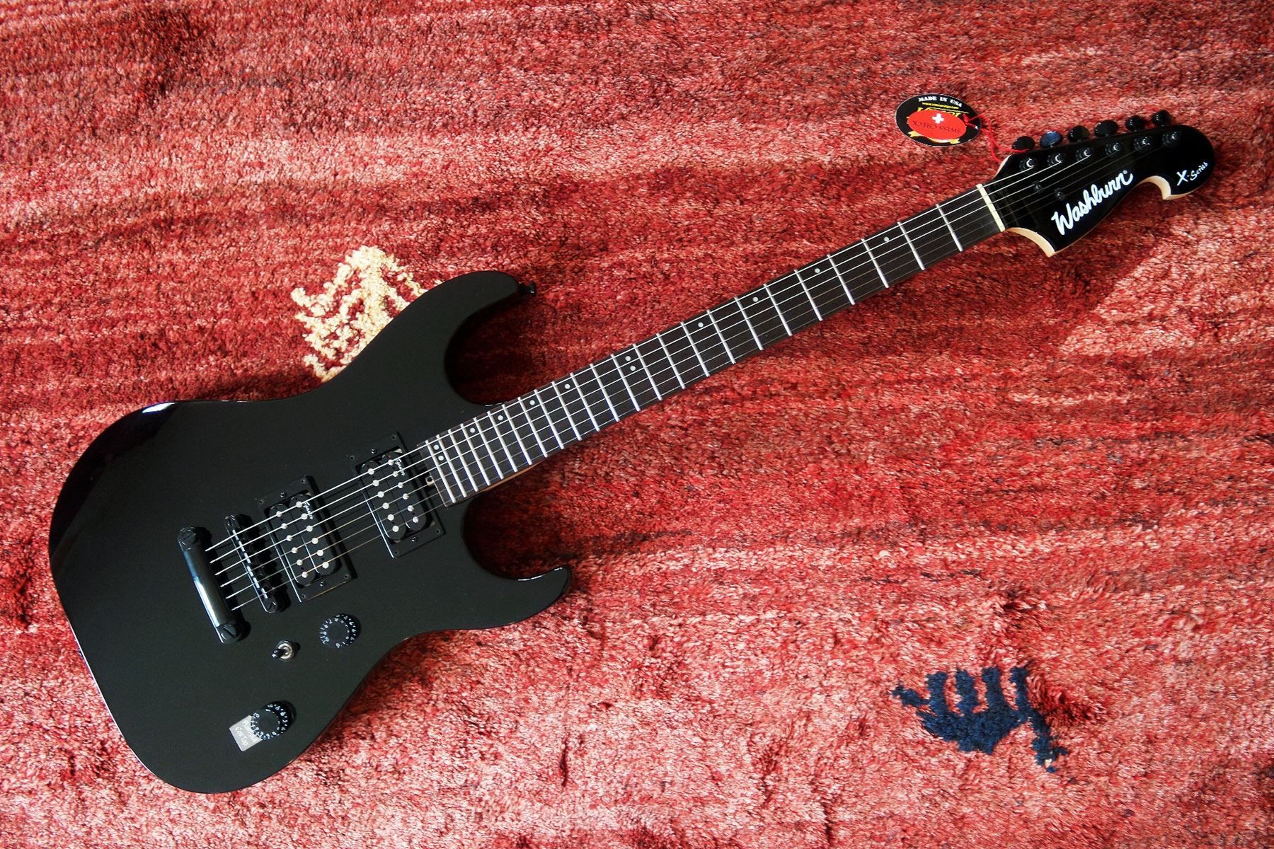 Strumenti ad arco e pizzico: guitare Washburn X100 neuve avec housse – Nuovo (secondo la descrizione) da Goumoens-la-Ville venduto da Vitamine