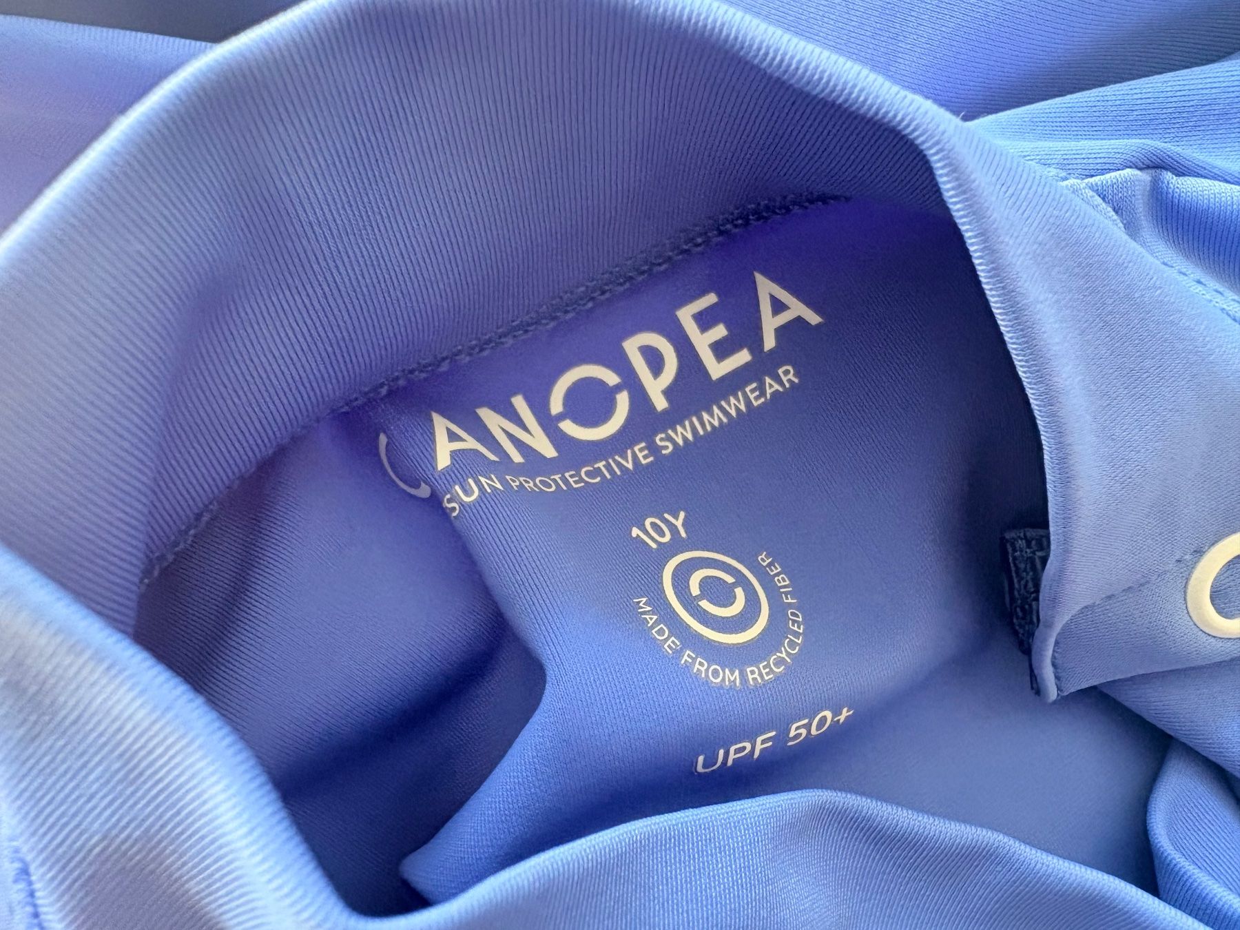 Badekleider & Bikinis: Canopea, UV-Shirt, 134/140 – Gebraucht aus Zürich von Pokimoki_1 1