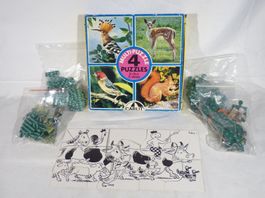 4 Kinderpuzzles und ein Globi-Puzzle extra
