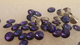 Swarovski 1122 Rivoli ss24(5mm) Heliotrope 30St.