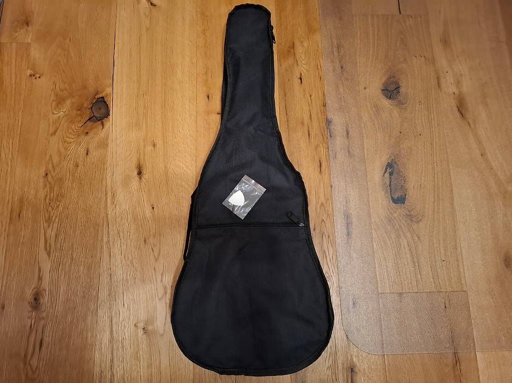 Musikinstrumente: Gitarre 1/4 – Gebraucht aus Halten von Mutzji 1