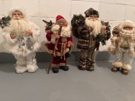 4 Weihnachtsmann Figuren Set Dekoration guter Zustand