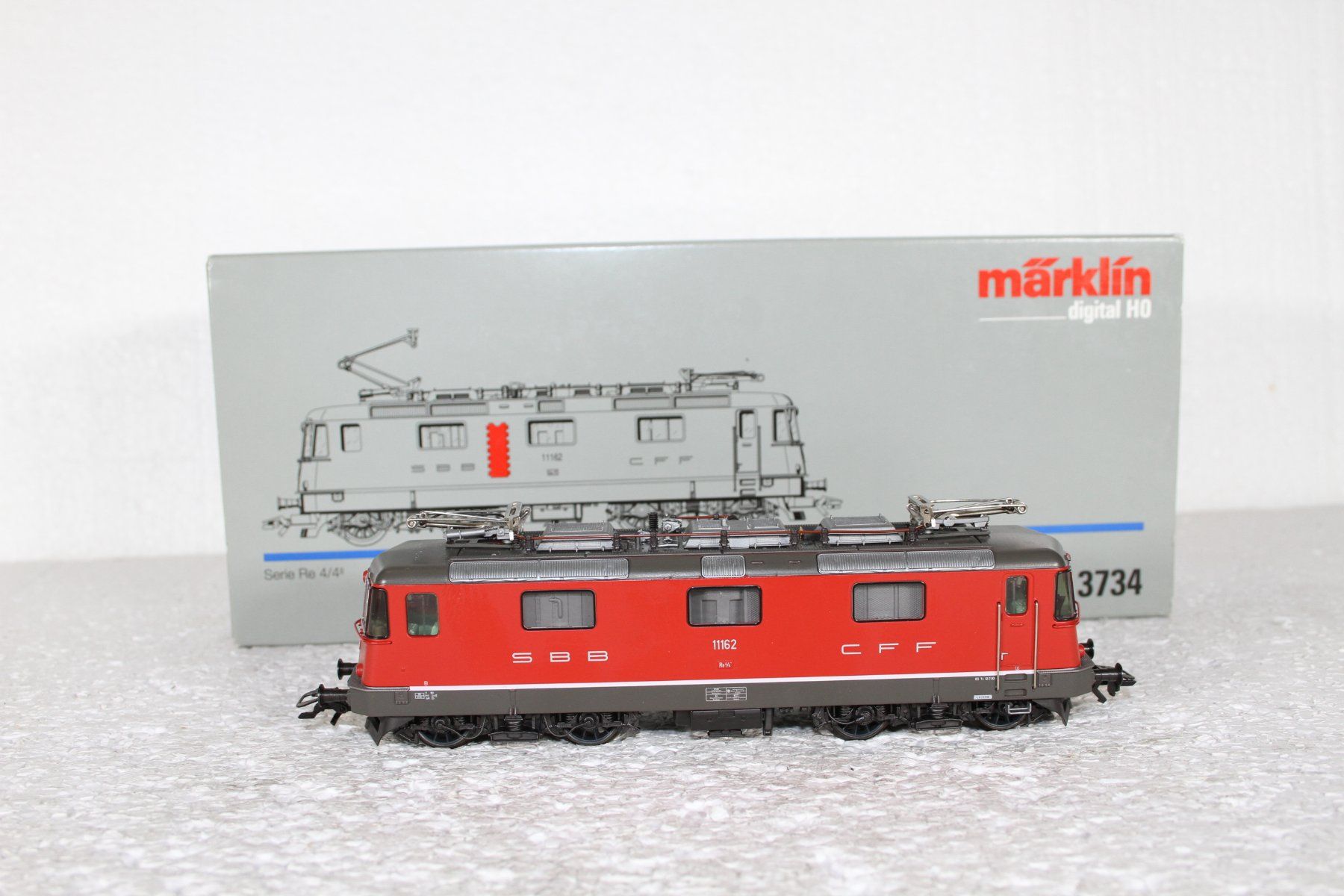 Märklin Modellini di ferrovie: Märklin 3734 SBB Re 4/4 – Usato da Triesen venduto da gleis8 3