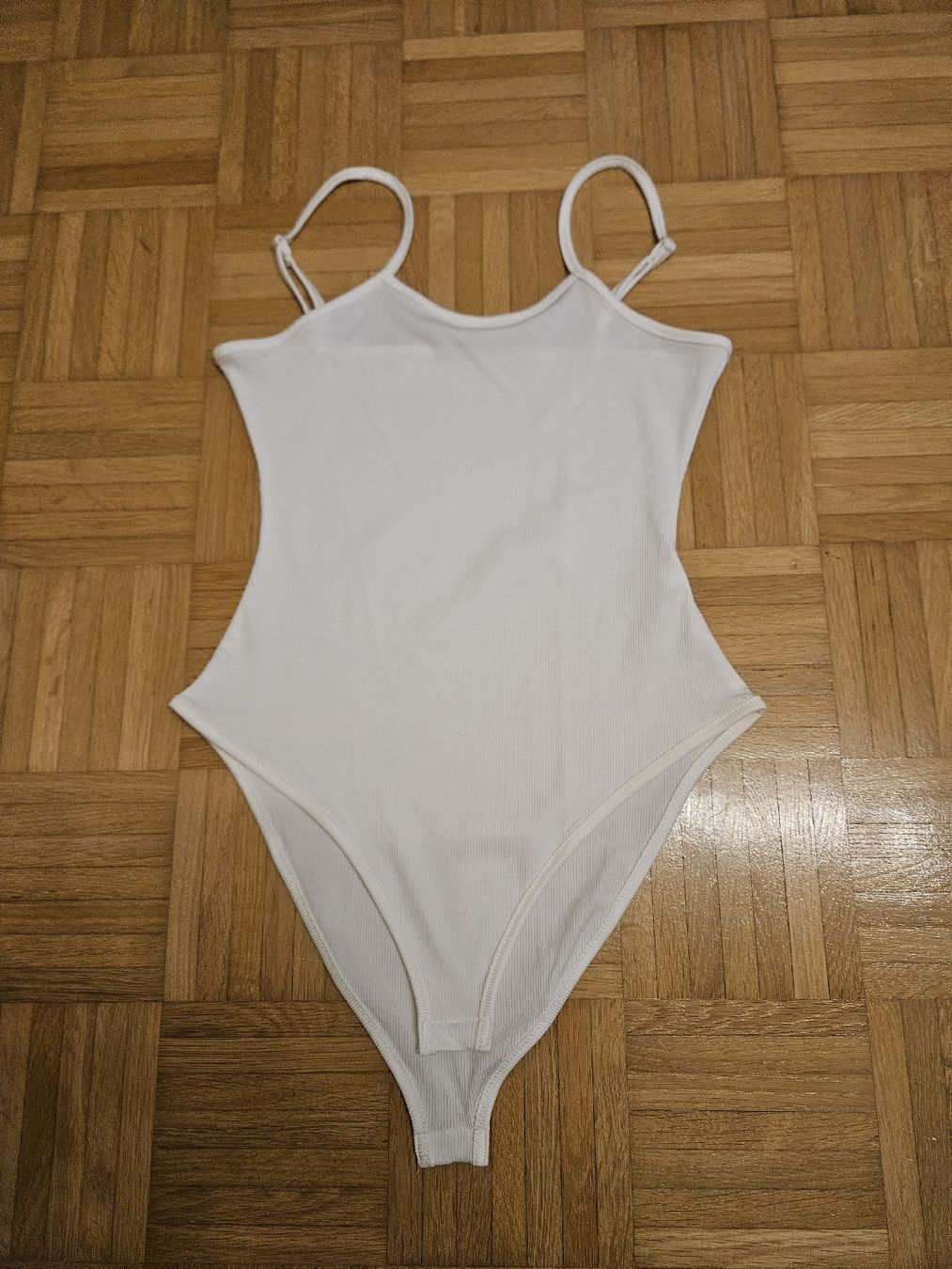 Top: Weisser Body mit Spaghettiträger, Grösse M – Usato da Dickbuch venduto da lea_6m8c 1