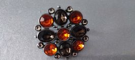 Vintage Brosche mit braunen und orangen Schmucksteinen