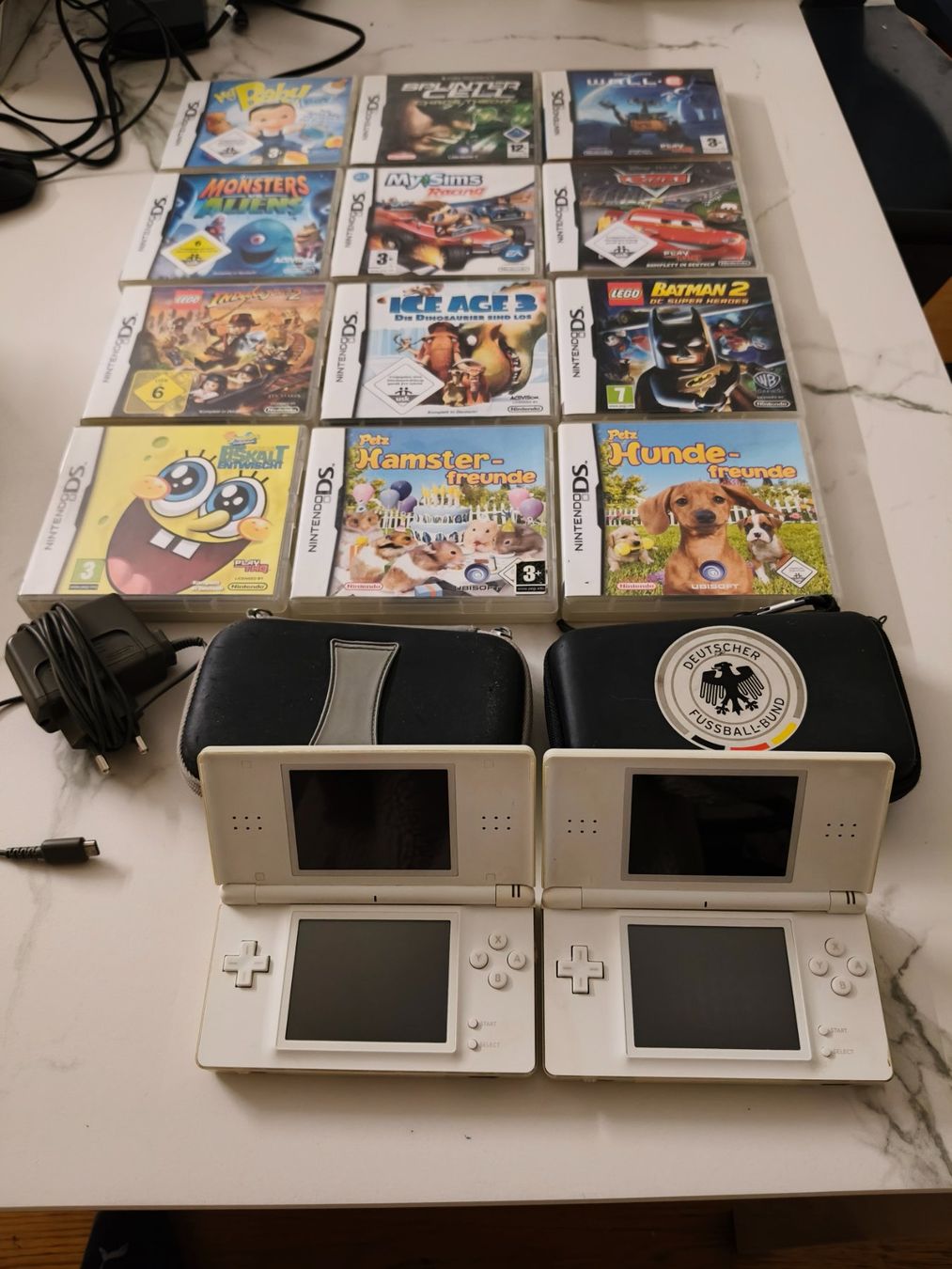 Nintendo Konsolen: Nintendo DS Lite Bundle, 2 Konsolen & 12 Spiele – Gebraucht aus Oensingen von ece_8k7q