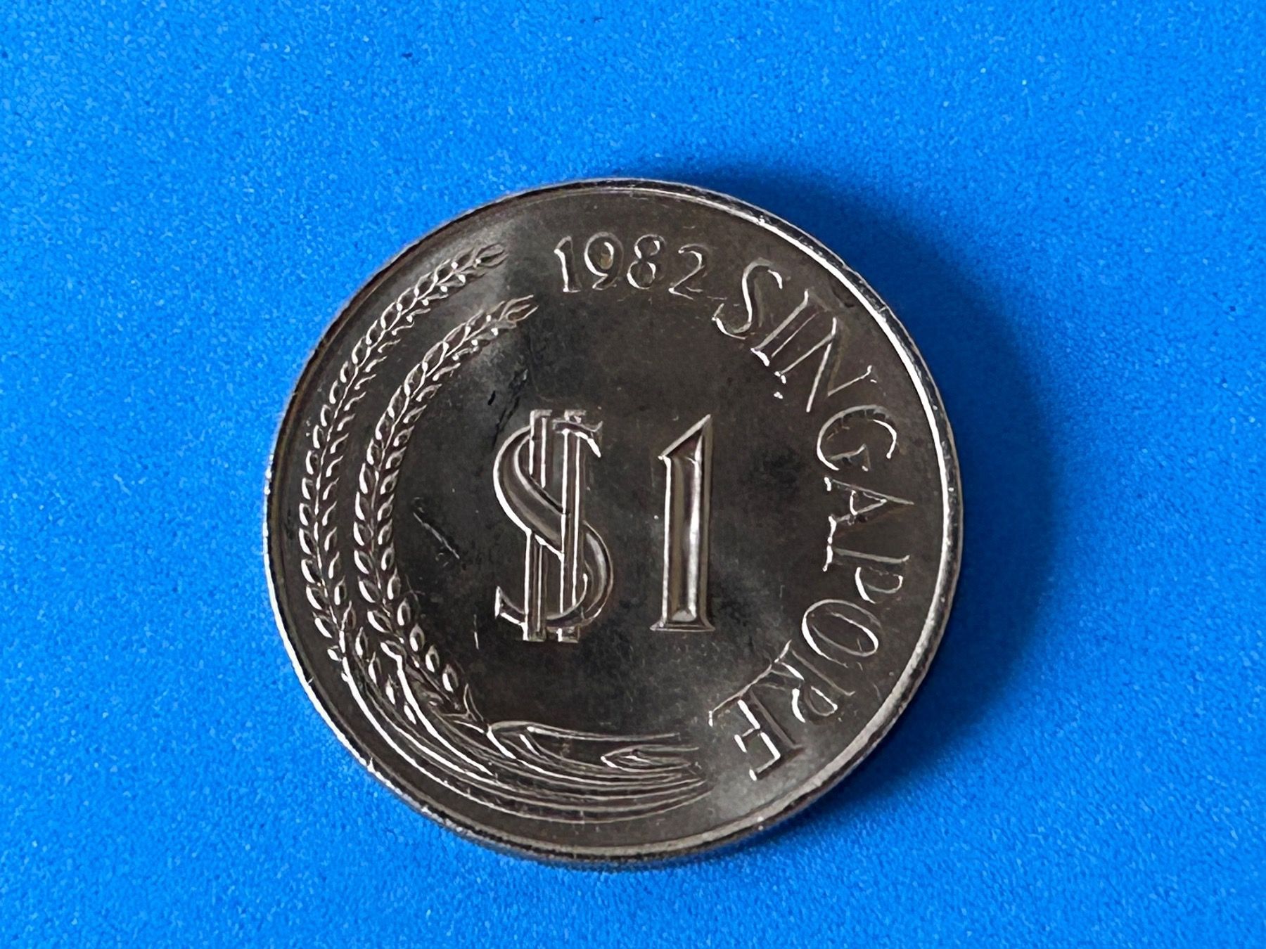 Tutti le monete: Singapore - 1 Dollar 1982 – Usato da Corcelles NE venduto da AJKader 8